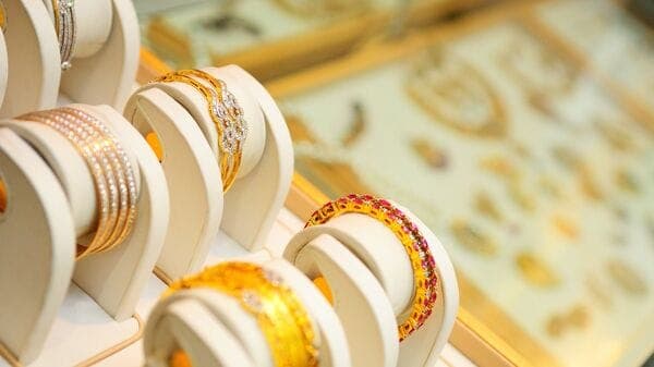 Gold Dips After Hitting Record Highs